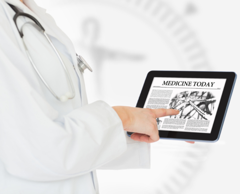 Doctor reading medicine today from digital tablet