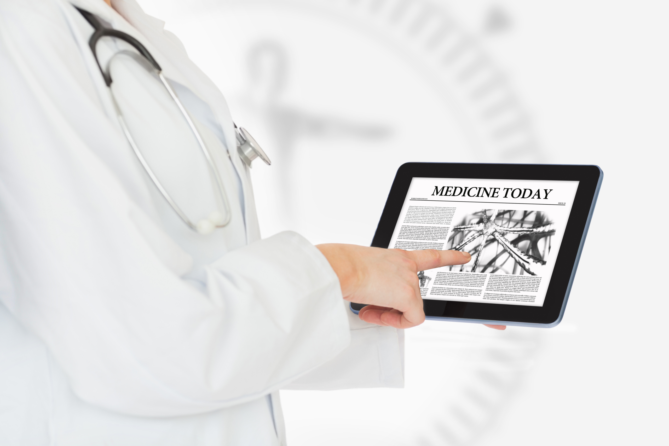 Doctor reading medicine today from digital tablet